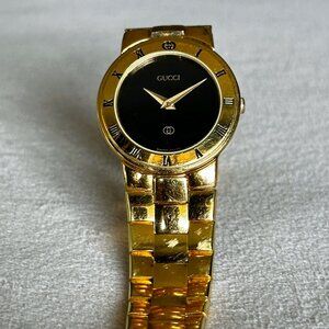 Vintage Gucci 3300L Women's Gold Watch with Black Dial